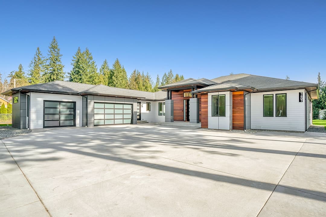 Finished home with new concrete driveway